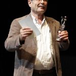 Syrian director Abdel Latif Abdul Hamid holds the bronze after taking third place with the film "Matar Ayloul" (September Rain) on the final day of the Damascus International Film Festival in the Syrian capital, on November 13, 2010. AFP PHOTO/LOUAI BESHARA (Photo credit should read LOUAI BESHARA/AFP/Getty Images)